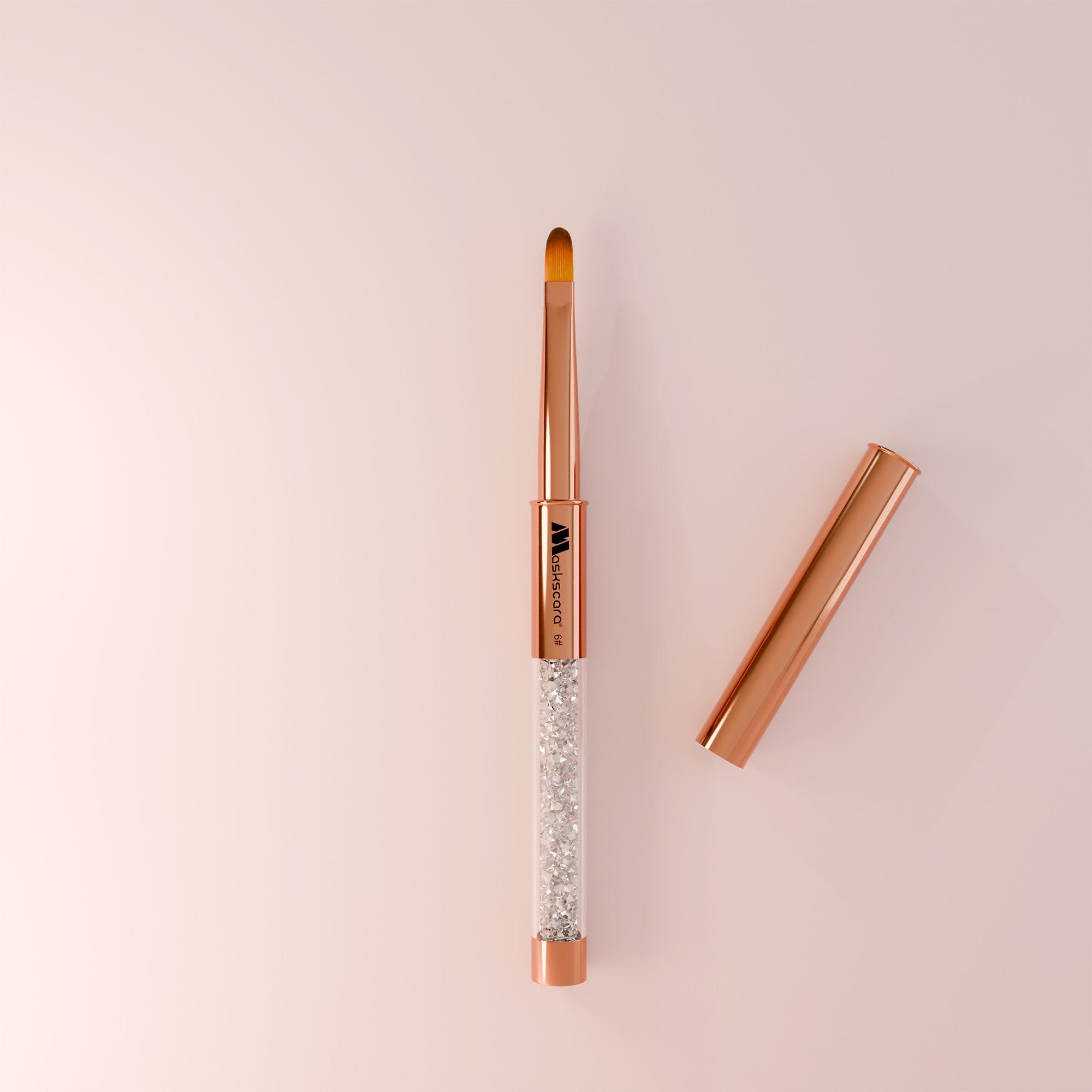 <img scr = “Maskscara Rose Gold no.6 Round Gel Brush.jpg” alt = “Size 6 Rose Gold round gel brush by the brand Maskscara”>